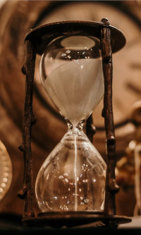 Hourglass representing time running out for struggling readers.